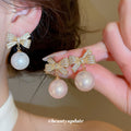 Gold Bow Pearl Drop Stud Earrings Fashion Jewelry Accessories view 1