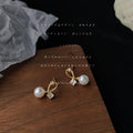 Gold Tone Twisted Loop And White Pearl Drop Stud Earrings For Women view 4