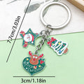 Christmas Charm Keychains Featuring Silver Santa Across 41 Pictured Variations view 10