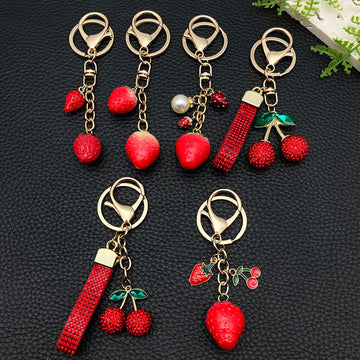 Six Red Rhinestone Cherry and Strawberry Metal Keychain Designs
