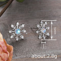 Blue Center Snowflake Stud Earrings in Silver Tone view 4