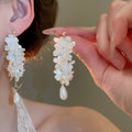 White Floral Pearl Stud and Hoop Earrings in Fourteen Styles view 6