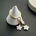 White Sakura Flower Enamel Charm Keychain with Gold Tone Ring view 6