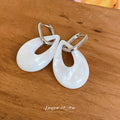 Translucent Teardrop Hoop Earrings in White or Pink view 4