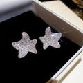 Silver Tone Pavé Star Stud Earrings In Two Silhouettes view 6