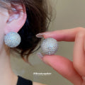 Silver Tone Pavé Crystal Sphere Stud Earrings With Grid Texture view 1
