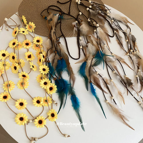 Sunflower headband and blue natural feather bead headbands flat lay