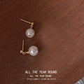 Gold Tone White Pearl Drop Stud Earrings In Small And Large Sizes view 6