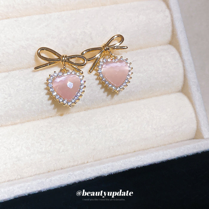 Pink Heart Crystal Edge And Bow Gold Tone Stud Earrings