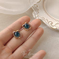 Blue Green Square Cabochon Stud Earrings Gold Wavy Frames view 1
