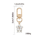 Flower Charm Keychains Featuring Pink Butterfly Across 10 Pictured Variations view 12