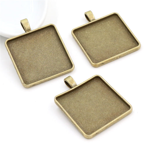 square cabochon pendant trays shown in a close detail view