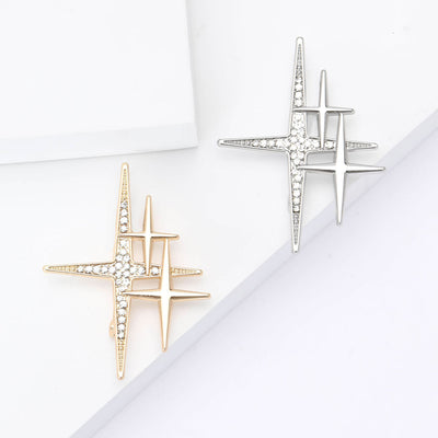 Product display showing overlapping slim four-point stars with a line of clear crystals