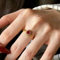 Gold Tone Open Ring Red Oval Halo Clear Border Stones view 1