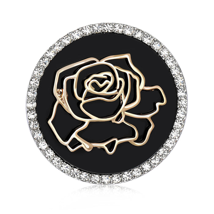 Round Rose Brooch In Metal With A Black Enamel Field, Gold-Tone Rose Outline, And Crystal