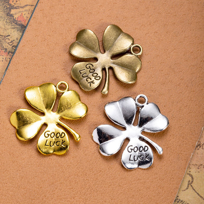 GOOD LUCK clover charms in grouped front view