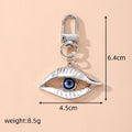 Large Gold and Silver Tone Blue Eye Clip Keychains view 4