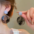 Marbled Resin Double Disc Earrings in Blue and Green view 4