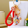 Mixed Pearl Round Fish and Jeweled Pufferfish Keychains with Fortune Loops view 1