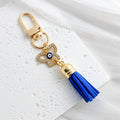 Gold Tone Evil Eye Charm Keychain with Blue Tassel and Rhinestone Accents view 3