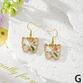 Gold Tone Pressed Flower Butterfly Drop Earrings in Twelve Designs view 10