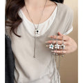 Silver Tone Flower Lariat Necklace With Red Center view 1