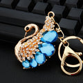Mixed Rocking Horse Swan Peacock and Cross Keychains in Eight Designs view 3