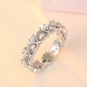 Open Heart And Clear Stone Eternity Ring In Two Metal Tones