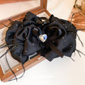 Black Satin Bow Hair Claw With Feathers And Heart Crystal view 2