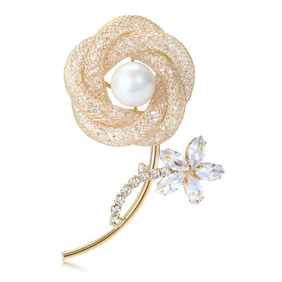 Front product view of the gold tone rose brooch on a light background