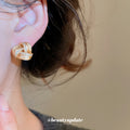 Gold Tone Woven Knot Stud Earrings Decorative Jewelry Pair view 3