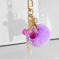 Faux Fur Pompom Charm With Pearl Beaded Strap And Bow view 4