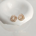 Gold Hollow Oval Baguette Crystal Stud Earrings Pair view 1
