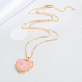 Gold Tone Pearlescent Heart Pendant Necklaces in Pink and Purple view 4