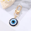Gold and Silver Tone Round Blue Evil Eye Clip Keychains in Two Sizes view 6
