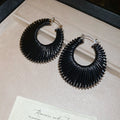 Woven Open Circle Huggie Earrings In Eight Designs view 6