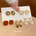 Gold Multi Pair Stud Earring Set Flower Pearl Hoop Cross view 3