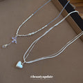 Silver Layered Heart and Butterfly Pendant Necklaces view 2