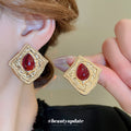 Gold Tone Textured Shield Necklace And Red Teardrop Square Earrings view 3