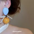 Blue and Amber Bow Drop Earrings with Pearl Strands view 3