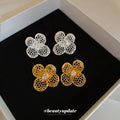 Openwork Four Petal Flower Stud Earrings in Two Finishes view 1