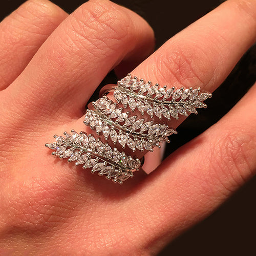 Second product view showing silver-tone layered marquise-leaf oversized wrap ring