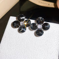 Black Crystal Flower Stud Earrings With Polished Metal Details view 2