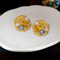 Gold Tone Round Floral Stud Earrings With Pearl Like Accents view 6