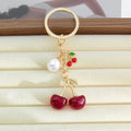 Cherry Pendant Keychain With Faux Pearl And Metal Leaf Charm view 2