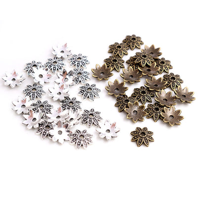层叠花朵珠帽 displayed assortment on a white background