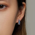 Silver Blue Purple Cluster Stone Huggie Hoop Earrings view 3