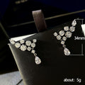 Asymmetric Floral Clear Stone Long Drop Earrings In Silver Tone view 5