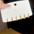Gold Tone Multipack Of Minimal Studs And Huggie Hoops view 6