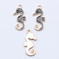 Black and White Enamel Seahorse Charm with Gold Tone Outline view 1